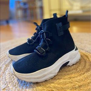 Black and white slip on bootie sneakers